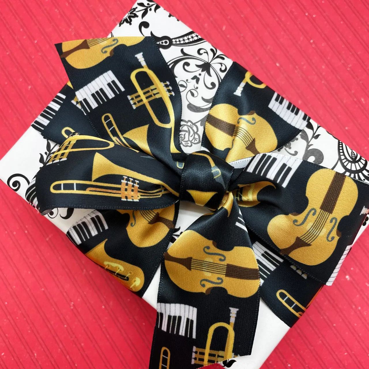 Musical Instruments in gold, black and white printed on 1.5"white single face satin